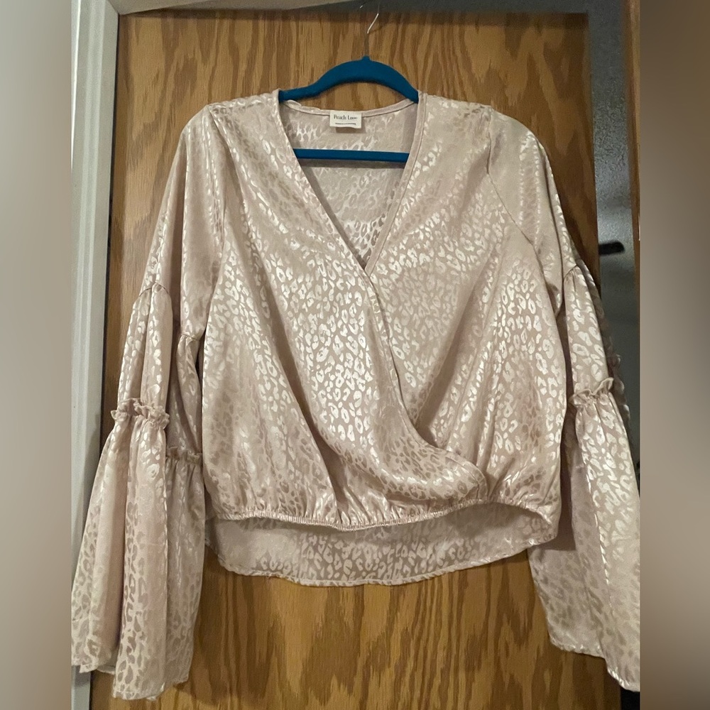 Boutique label cheetah print bell sleeve top
